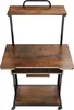 A view of a brown wooden computer desk with black metal legs and wheels. Náhled obrázku produktu