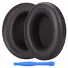 Two brown ear pads for headphones and a blue plastic tool. Produktbild-Vorschau