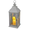 A white vintage-style lantern with three LED candles inside, set against a white background. Produktbild-Vorschau