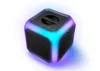 A cube-shaped portable speaker with colorful LED lights. Produktbild-Vorschau