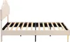 A side view of a beige upholstered bed frame with a slatted wooden mattress support. Náhled obrázku produktu