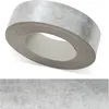 A roll of edge banding tape with a concrete stone pattern and a separate strip showing the pattern. Produktbild-Vorschau
