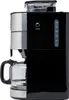 A black and silver coffee maker with a glass carafe is shown against a white background. Anteprima dell’immagine prodotto