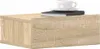 A floating nightstand with a book and a cup of coffee on top. Produktbild-Vorschau