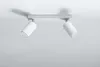 A white ceiling light fixture with two adjustable spotlights is mounted on a white ceiling. Náhled obrázku produktu