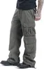 A person wearing olive-colored cargo pants and black boots, shown from the side. Produktbild-Vorschau