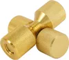 A close-up, studio shot of four golden, knurled metal objects arranged in a cross shape, with a central threaded shaft visible. Náhľad obrázku produktu