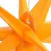 Close-up of an orange star-shaped decoration. Voir les images du produit