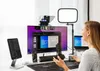 A woman is using a teleprompter setup for a video call or presentation. Náhľad obrázku produktu