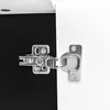 A close-up shot of a cabinet hinge connecting a white door to a black interior. Anteprima dell’immagine prodotto