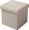 A beige fabric storage ottoman with a tufted lid. Produktbild-Vorschau