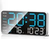 A digital clock displaying time, date, and temperature. Produktbild-Vorschau