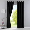 A pair of black curtains are shown tied back, revealing a window with a view of trees and grass. Produktbild-Vorschau
