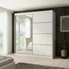 A white sliding door wardrobe with a mirrored door, placed in a bedroom setting with a window and a bed visible. Produktbild-Vorschau