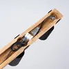 Close-up view of the internal wiring and wooden housing of a light fixture. Podgląd zdjęcia produktu
