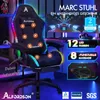 A gaming chair with LED lights and massage features displayed in a room with other gaming accessories. Podgląd zdjęcia produktu