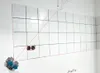 A laser level tool is set up on a wall with tiles, with red laser lines projected. Voir les images du produit