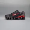 A side view of a Nike Shox TL sneaker against a plain gray background. Produktbild-Vorschau