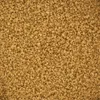 A close-up, top-down view of granulated brown sugar. Podgląd zdjęcia produktu