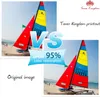 A collage comparing an original image of sailboats on a beach with a "Toner Kingdom printout" showing improved color restoration. Produktbild-Vorschau