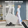 A woman is standing next to a power lift recliner chair that is partially raised. Voir les images du produit