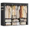 A fabric wardrobe with clothes hanging inside and storage boxes on the shelves. Náhled obrázku produktu