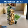 A modern living room with a fireplace and a metal firewood rack filled with logs. Produktbild-Vorschau