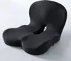 A dark gray ergonomic seat cushion with a cut-out center, designed for office chairs. Produktbild-Vorschau