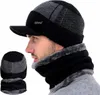 A man wearing a winter hat and scarf set. Produktbild-Vorschau