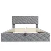 A grey upholstered bed frame with a slatted base, shown from the front. Anteprima dell’immagine prodotto
