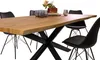 A dining table with chairs, set against a white background. Produktbild-Vorschau