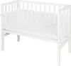 A white wooden crib with a mattress and a white mesh bumper pad. Produktbild-Vorschau