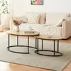 A living room scene with a sofa and two coffee tables. Produktbild-Vorschau