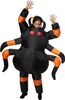A person wearing an inflatable spider costume. Produktbild-Vorschau