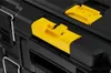 Close-up of a black modular toolbox with yellow latches. Voir les images du produit