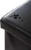 A close-up view of a black faux leather ottoman with water droplets on its surface. Náhled obrázku produktu