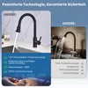 Comparison of two kitchen faucets, highlighting features of one over the other, with a sleeping person at the bottom. Produktbild-Vorschau