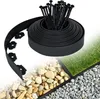 A roll of black flexible garden edging and stakes, shown with a background split into grass, pebbles, and gravel. Produktbild-Vorschau