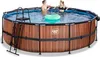 Two women are enjoying themselves in an above-ground swimming pool with a wooden exterior. Produktbild-Vorschau