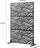 A black outdoor privacy screen with a leaf pattern, shown freestanding with dimensions indicated. Náhľad obrázku produktu