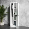 A white metal locker with two compartments, open and showing organized items like clothes, towels, and cleaning supplies, next to a potted plant against a textured gray wall. Náhled obrázku produktu