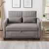 A gray sofa bed is shown in a living room setting. Náhled obrázku produktu