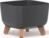 A dark gray square planter with three wooden legs. Náhled obrázku produktu