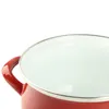 A close-up view of the inside and rim of a red enamel pot with a silver rim and a red handle. Produktbild-Vorschau