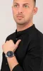 A man wearing a black shirt and a Maserati watch. Náhled obrázku produktu