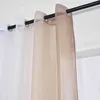 Close-up of two curtains hanging on a rod. Produktbild-Vorschau
