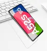 A smartphone screen protector is shown on top of a keyboard. Produktbild-Vorschau
