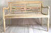 A light-colored wooden bench is displayed against a white and light gray background. Produktbild-Vorschau