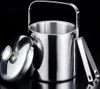 A stainless steel ice bucket with a lid and tongs, presented against a black background. Náhľad obrázku produktu