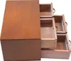 A wooden organizer with three drawers, viewed from a slightly elevated side angle. Podgląd zdjęcia produktu